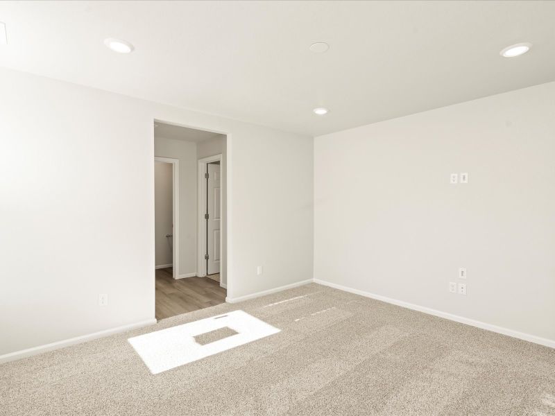Spacious, unfurnished interior of a new home in Lorson Ranch: The Trail Collection, Colorado Springs (Image 8).