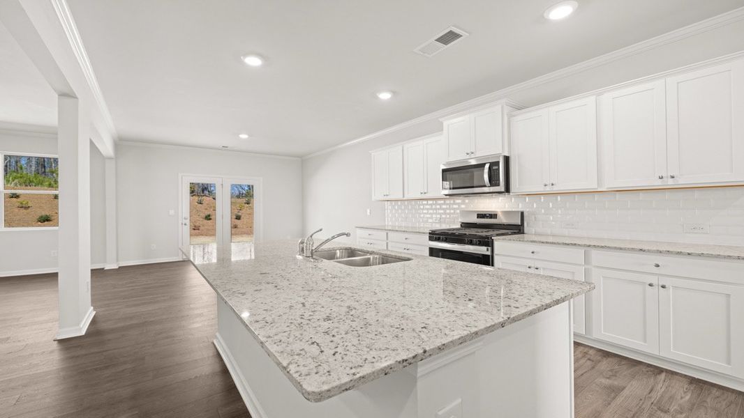 Representative furnished interior of a home built from the HALTON by D.R. Horton in Thompson Ridge, Dallas (Image 8). Representative furnished interior of a home built from the HALTON by D.R. Horton in Thompson Ridge, Dallas (Image 8).