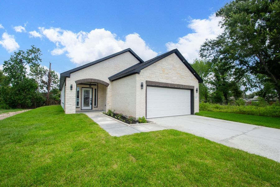 Front exterior of a new home in , Arcola, TX, highlighting curb appeal (Image 1). Front exterior of a new home in , Arcola, TX, highlighting curb appeal (Image 1).