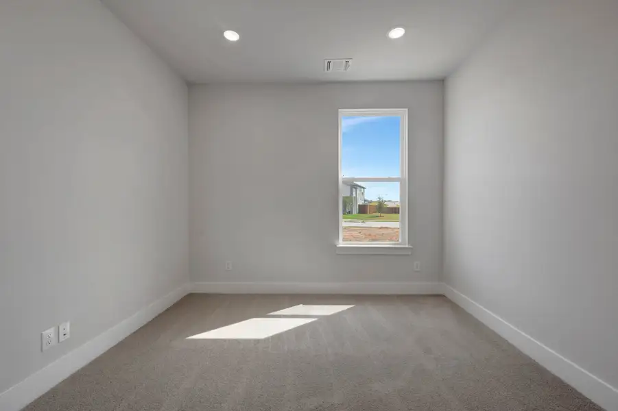 Spacious, unfurnished interior of a new home in The Meadows, Denton (Image 27).