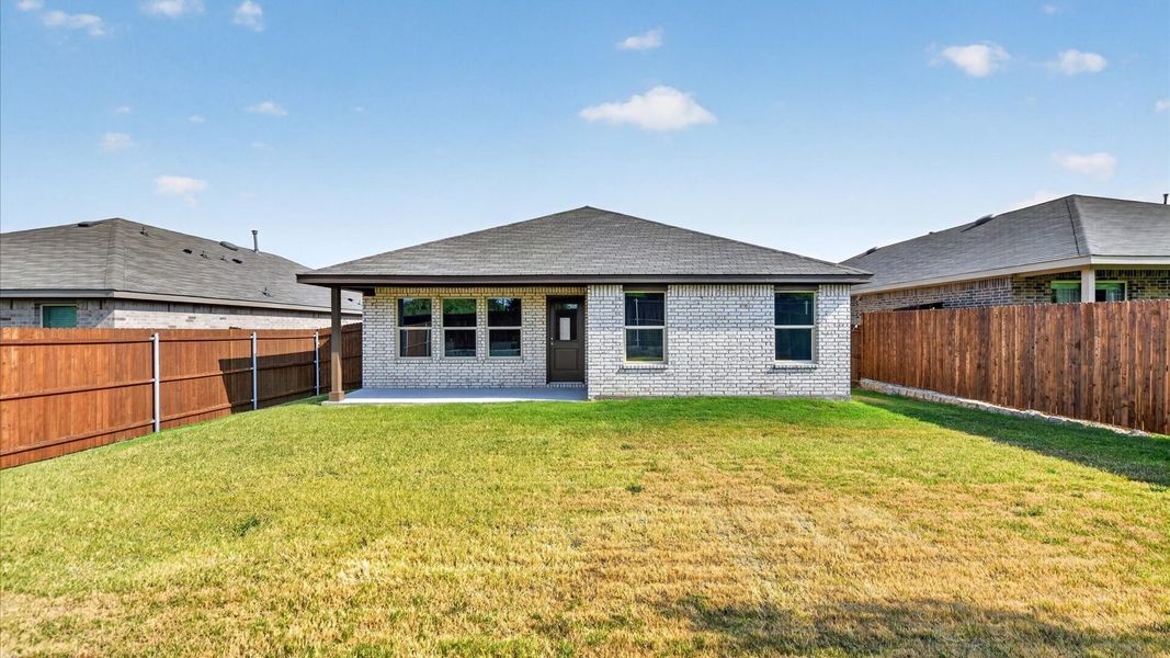 Exterior details and patio area of a home in Legado, Cleburne (Image 25).