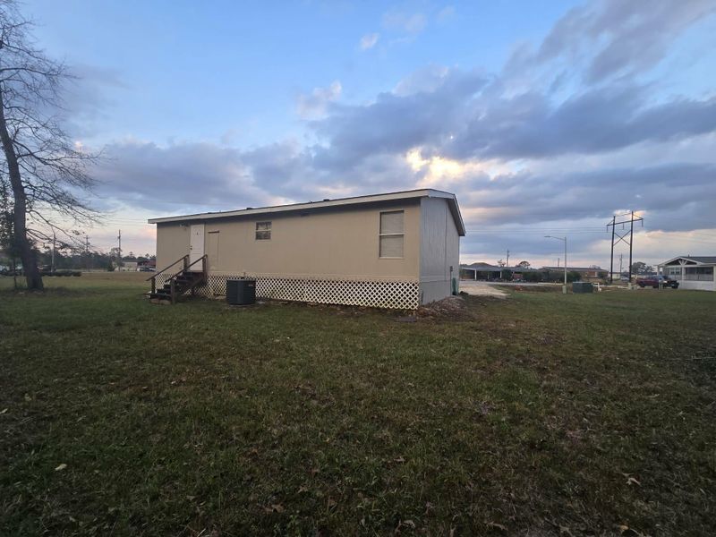 Exterior details and patio area of a home in , Conroe (Image 6). Exterior details and patio area of a home in , Conroe (Image 6).
