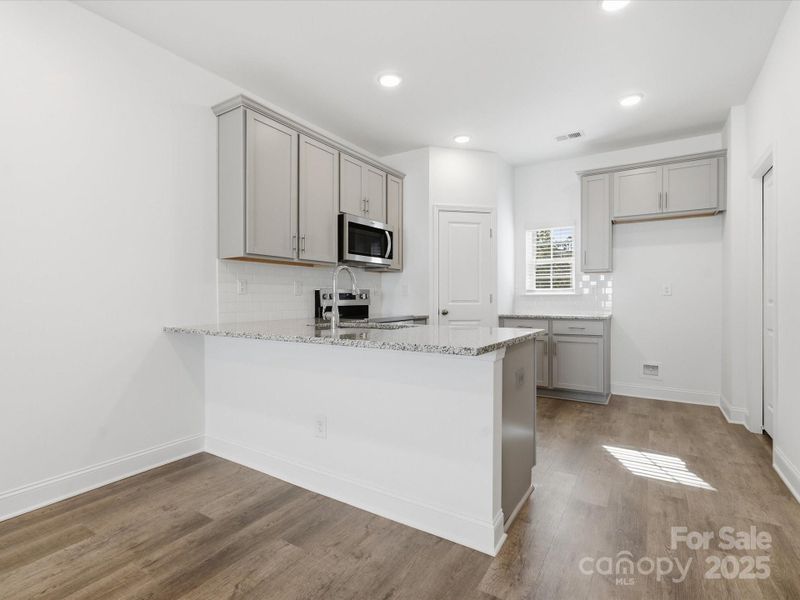 Furnished interior view inside a new home in Sycamore Trail, Matthews (Image 10).