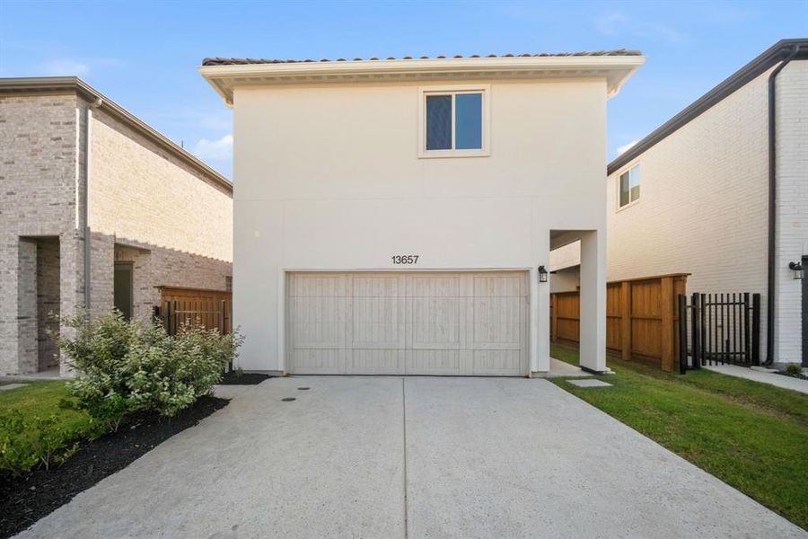 Front exterior of a new home in Fields Villas - Darling Homes, Frisco, TX, highlighting curb appeal (Image 27).