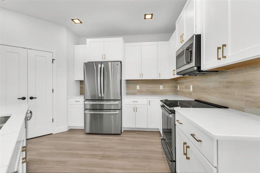 Furnished interior view inside a new home in , Port Charlotte (Image 5). Furnished interior view inside a new home in , Port Charlotte (Image 5).