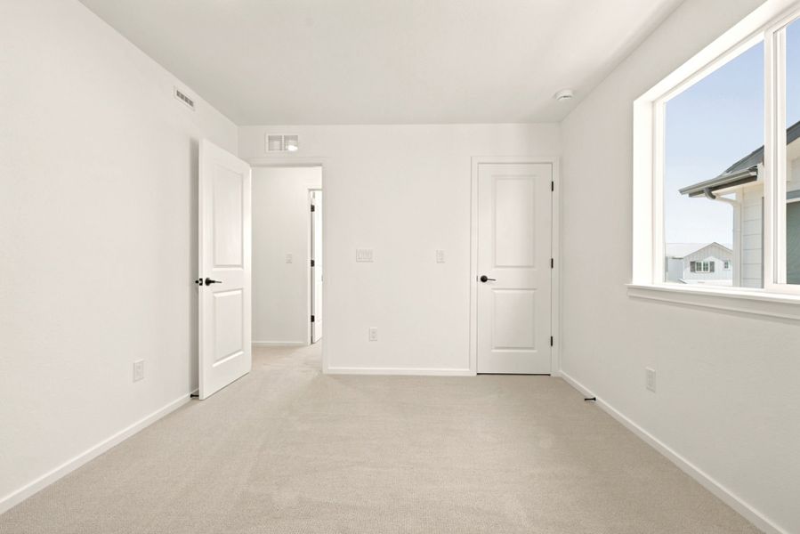Spacious, unfurnished interior of a new home in Cordovan, Firestone (Image 18).
