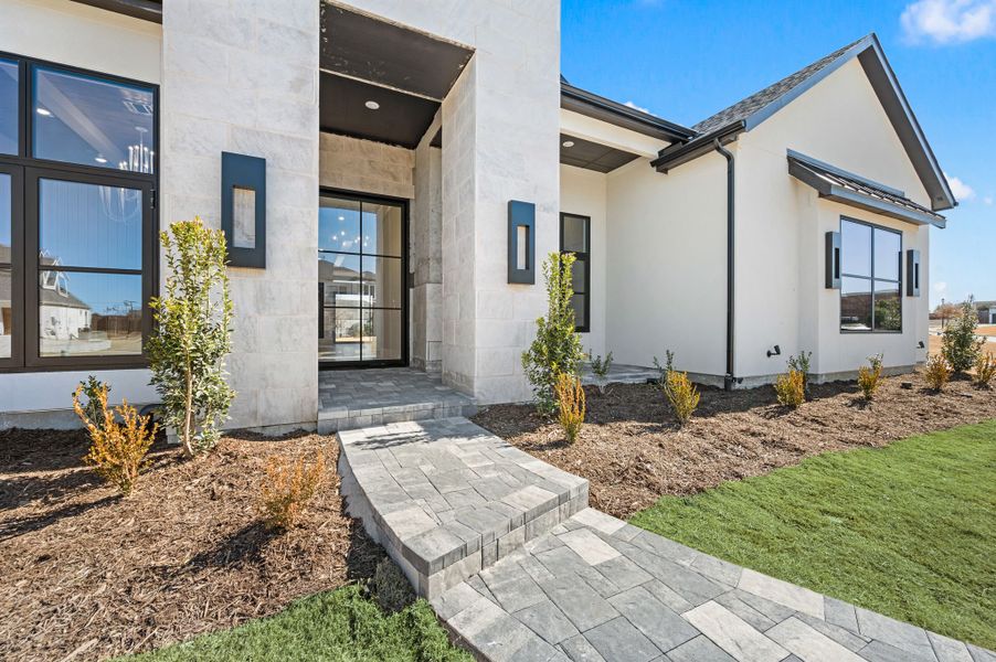 Exterior details and patio area of a home in Montclair, Prosper (Image 3). Exterior details and patio area of a home in Montclair, Prosper (Image 3).