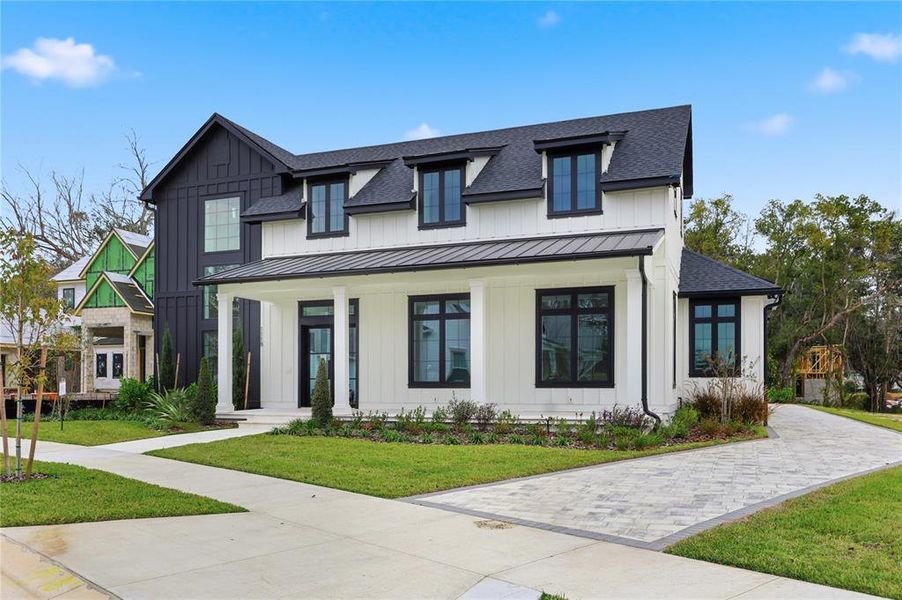 Front exterior of a new home in , Oakland, FL, highlighting curb appeal (Image 2). Front exterior of a new home in , Oakland, FL, highlighting curb appeal (Image 2).
