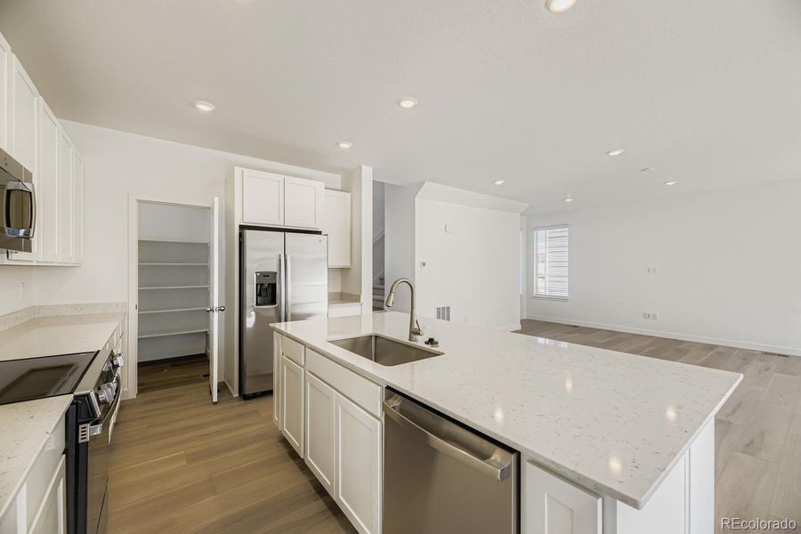 Furnished interior view inside a new home in Vermilion Creek: The Skyline Collection, Centennial (Image 5).