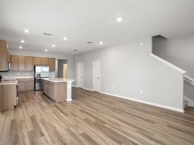 Enjoy a sunny, open living area - Danyella bungalow by Highland Homes