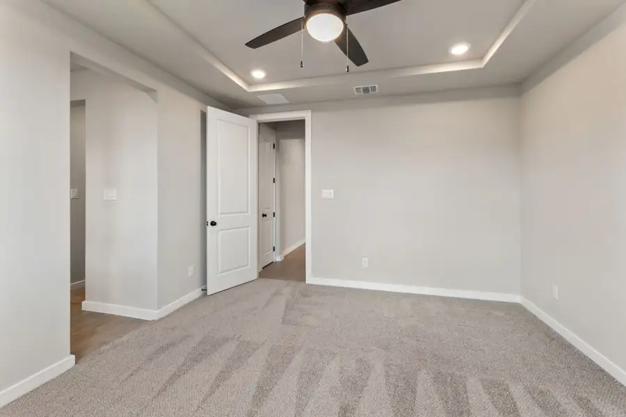 Representative unfurnished interior of a home built from the Pecos by Hakes Brothers in Highland Ridge, New Braunfels (Image 31).
