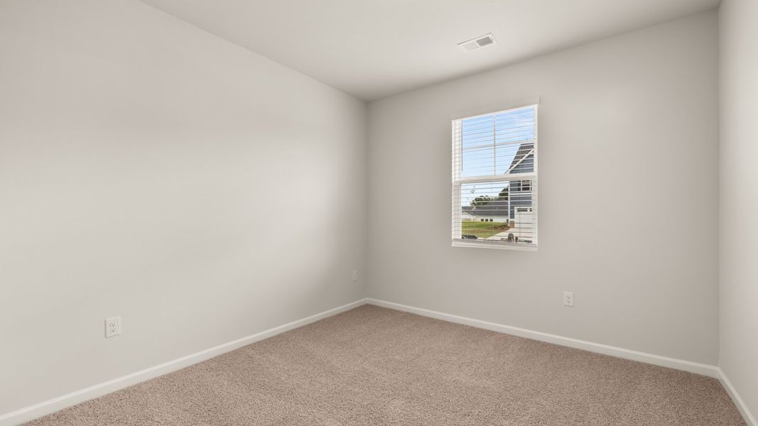 Spacious, unfurnished interior of a new home in Preserve at Dove Creek, Statham (Image 32).