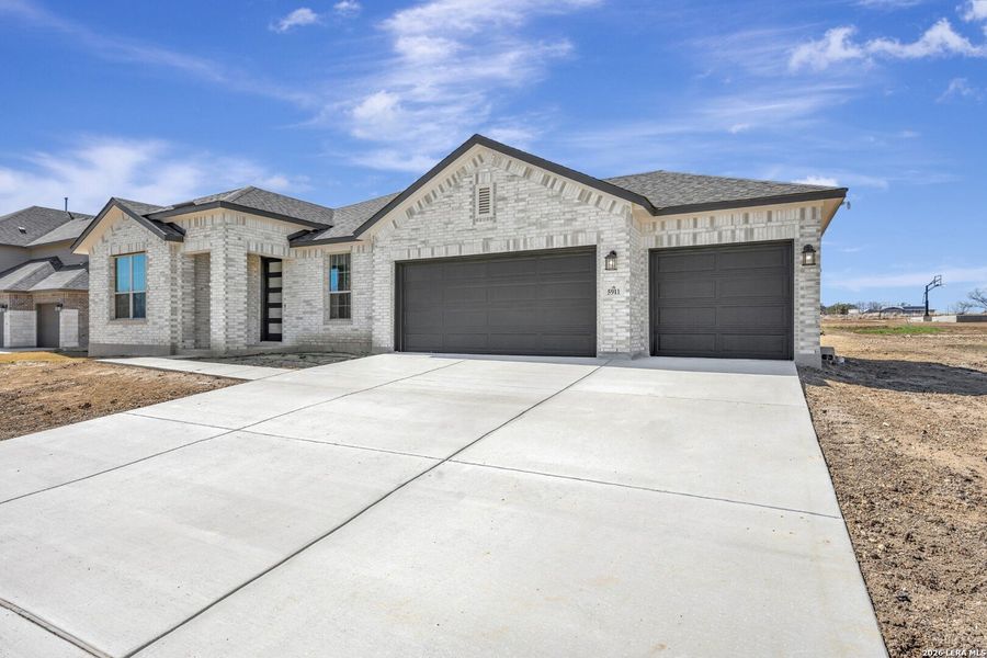 Front exterior of a new home in Preserve at Annabelle Ranch, San Antonio, TX, highlighting curb appeal (Image 20). Front exterior of a new home in Preserve at Annabelle Ranch, San Antonio, TX, highlighting curb appeal (Image 20).