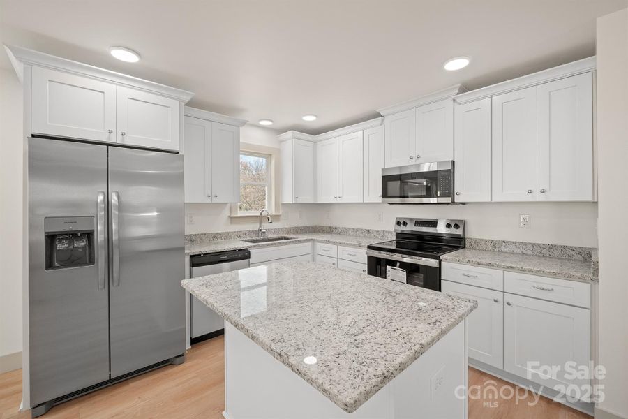 Furnished interior view inside a new home in , Newton (Image 4).