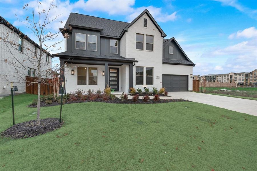 Front exterior of a new home in Estates at Rockhill, Frisco, TX, highlighting curb appeal (Image 26).