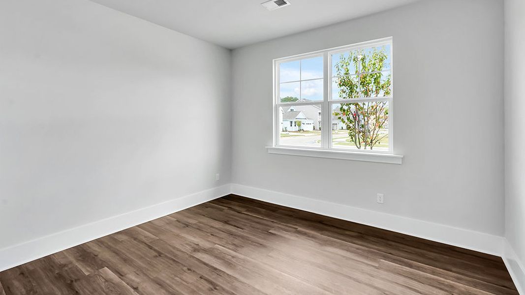 Spacious, unfurnished interior of a new home in The Haven at Indigo Preserve, Leland (Image 19).