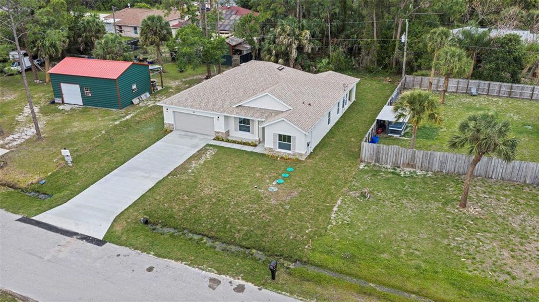 Front exterior of a new home in , Palm Bay, FL, highlighting curb appeal (Image 32).