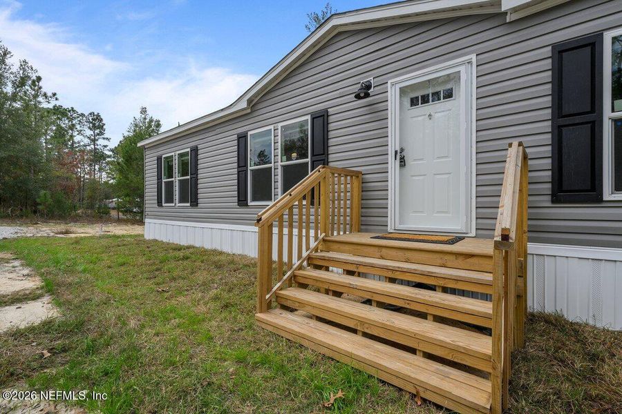 Exterior details and patio area of a home in , Hawthorne (Image 20).