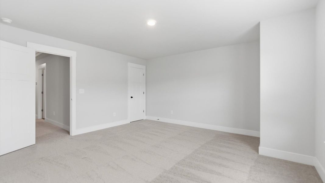 Furnished interior view inside a new home in Village at Midway, Anderson (Image 23).