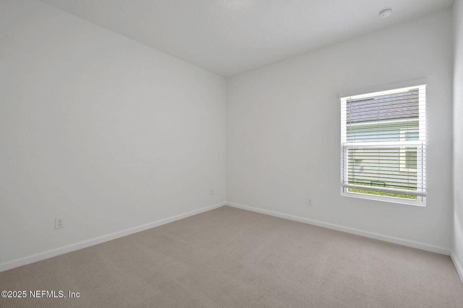 Spacious, unfurnished interior of a new home in Cordova Palms, St. Augustine (Image 28).