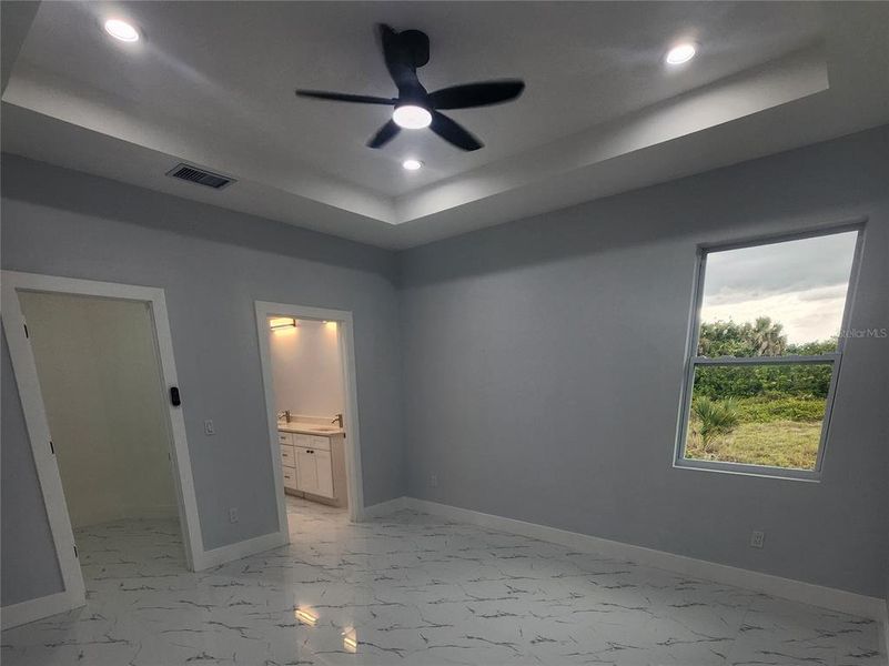 Spacious, unfurnished interior of a new home in , Port Charlotte (Image 24).