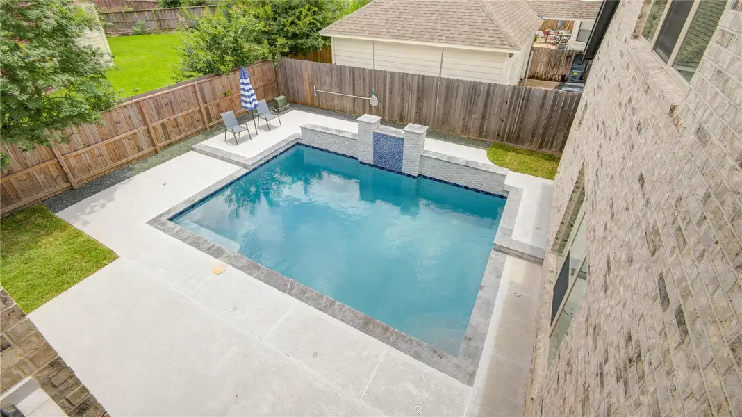 Exterior details and patio area of a home in , Spring (Image 3).