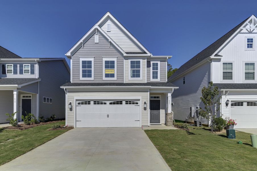 Front exterior of a new home in Ashton Lakes, Lexington, SC, highlighting curb appeal (Image 1).