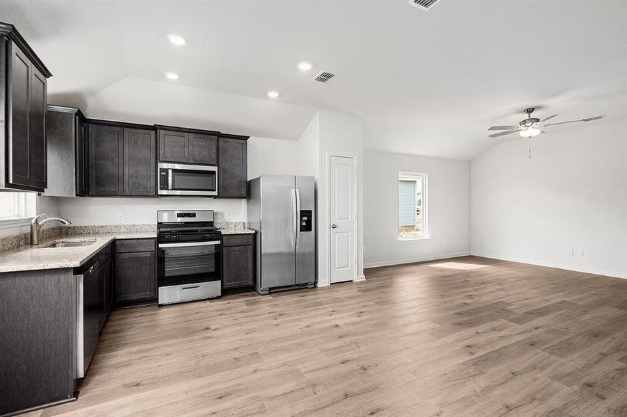 Furnished interior view inside a new home in Big Sky Estates, Ponder (Image 3).