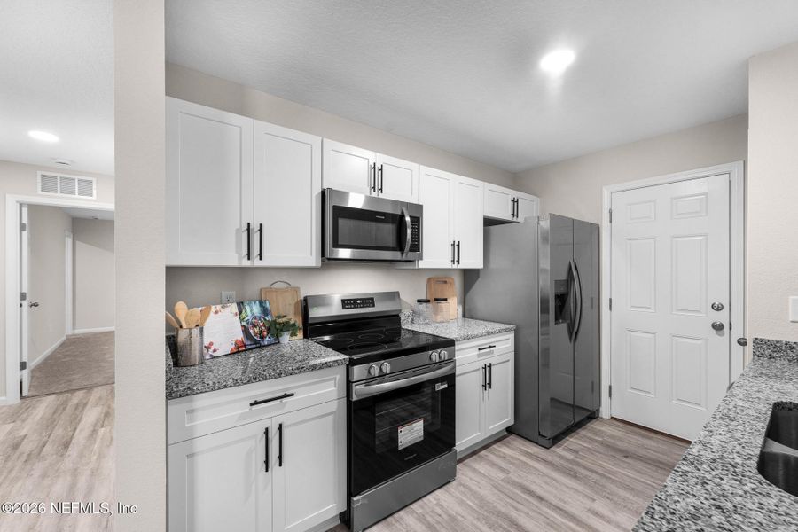 Furnished interior view inside a new home in , Jacksonville (Image 25).