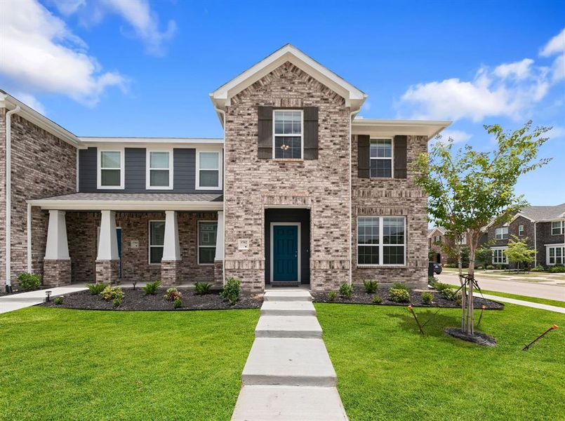 Front exterior of a new home in Heartland Townhomes, Heartland, TX, highlighting curb appeal (Image 20).