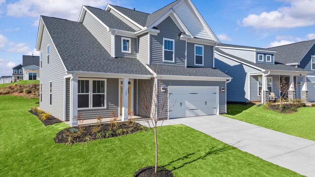 Front exterior of a new home in Fox Hollow, Spartanburg, SC, highlighting curb appeal (Image 20).