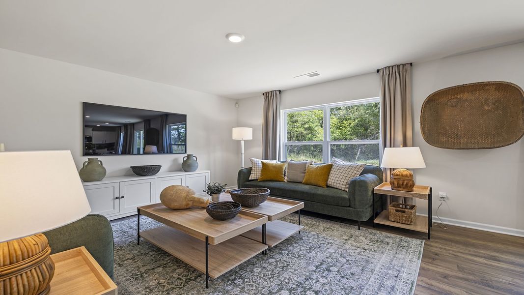 Furnished interior view inside a new home in Bentley Park, Greenwood (Image 10).