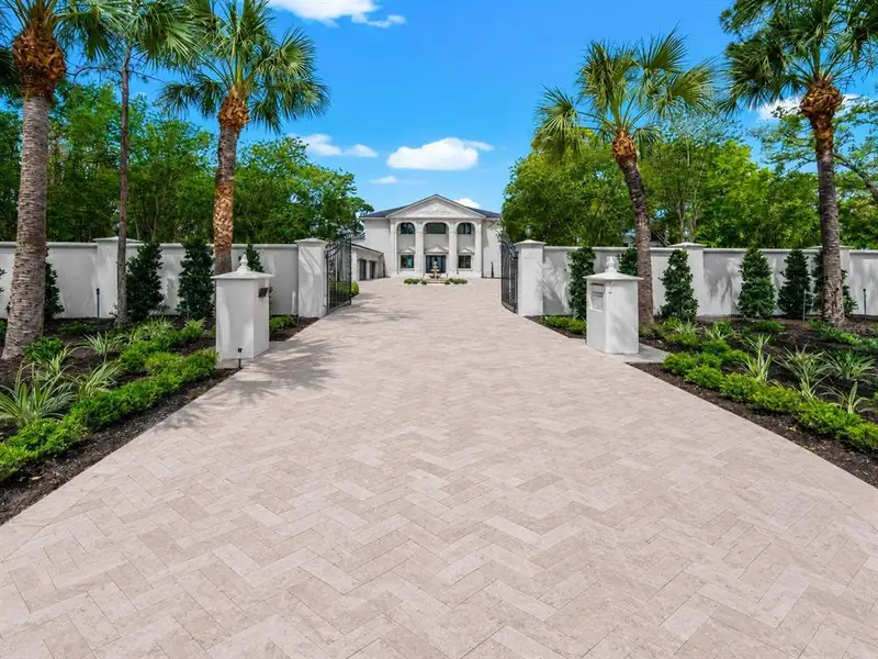 Front exterior of a new home in , Dunedin, FL, highlighting curb appeal (Image 2). Front exterior of a new home in , Dunedin, FL, highlighting curb appeal (Image 2).