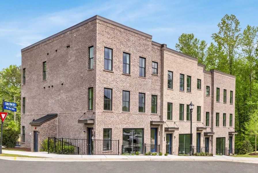 Front exterior of a new home in Echo Park, Suwanee, GA, highlighting curb appeal (Image 1).