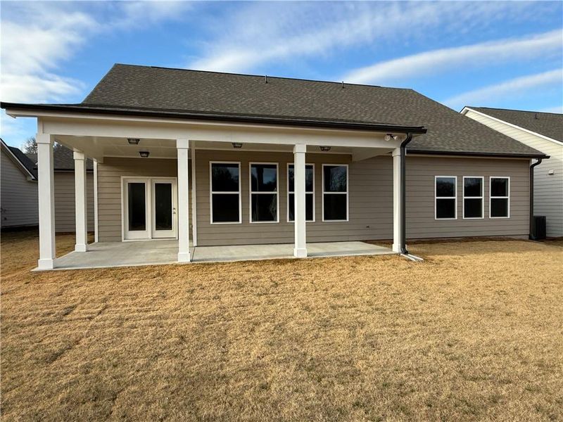 Exterior details and patio area of a home in Ponderosa Farms Reserve, Gainesville (Image 24).