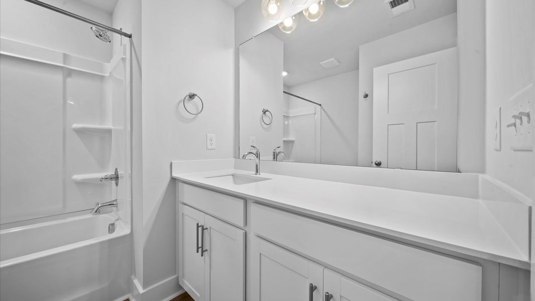 Elegant full bathroom with tasteful finishes and a thoughtfully designed layout at Saluda Crossing in Piedmont, SC