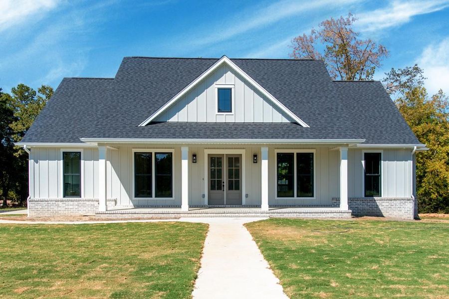 Front exterior of a new home in , Sealy, TX, highlighting curb appeal (Image 1). Front exterior of a new home in , Sealy, TX, highlighting curb appeal (Image 1).