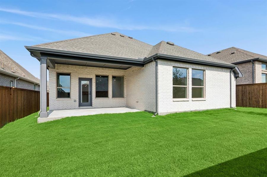 Front exterior of a new home in Monterra - Gardens, Fate, TX, highlighting curb appeal (Image 2). Front exterior of a new home in Monterra - Gardens, Fate, TX, highlighting curb appeal (Image 2).