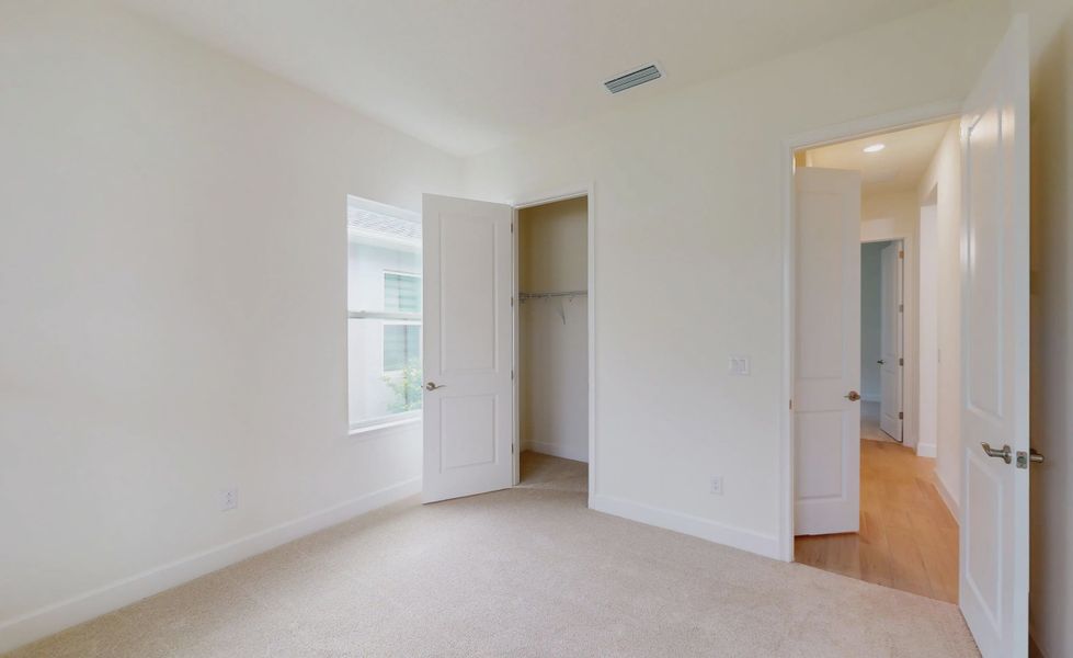 Spacious, unfurnished interior of a new home in Woodhaven, Port Orange (Image 31).
