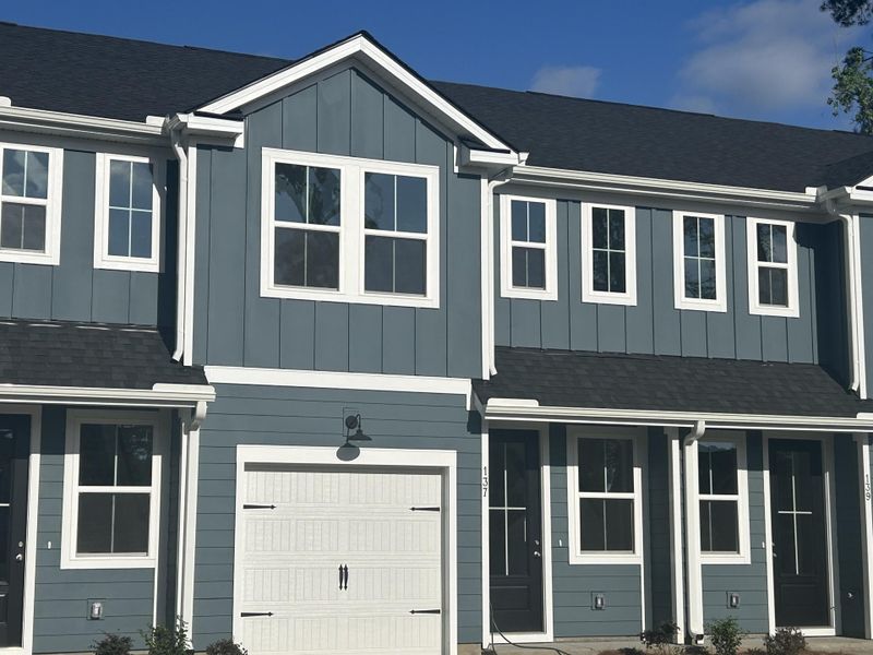 Front exterior of a new home in , Summerville, SC, highlighting curb appeal (Image 15).