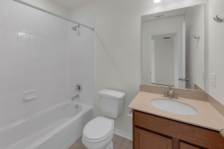 Furnished interior view inside a new home in Sonterra - Cool Water, Jarrell (Image 14).