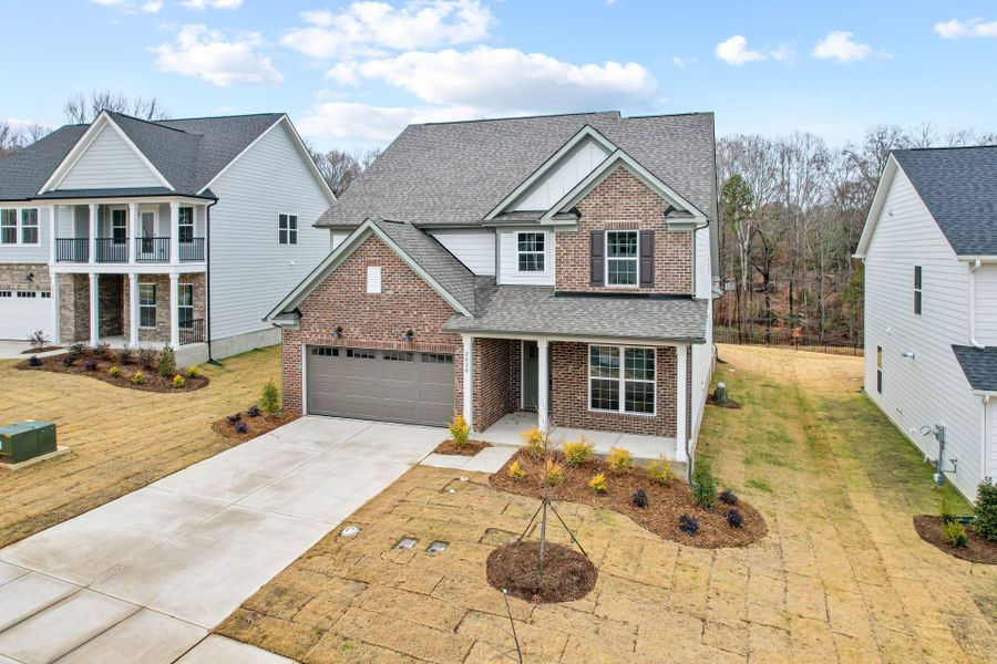 Front exterior of a new home in Forest Creek, Waxhaw, NC, highlighting curb appeal (Image 34).