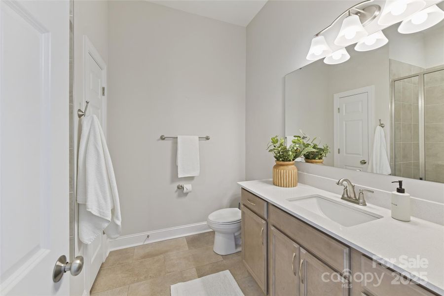 Primary Bath with tiled shower with bench!
