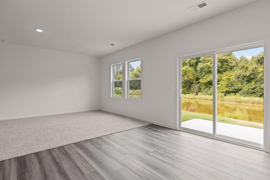 Representative unfurnished interior of a home built from the Hubble by Starlight Homes in Bayview, Conway (Image 17).