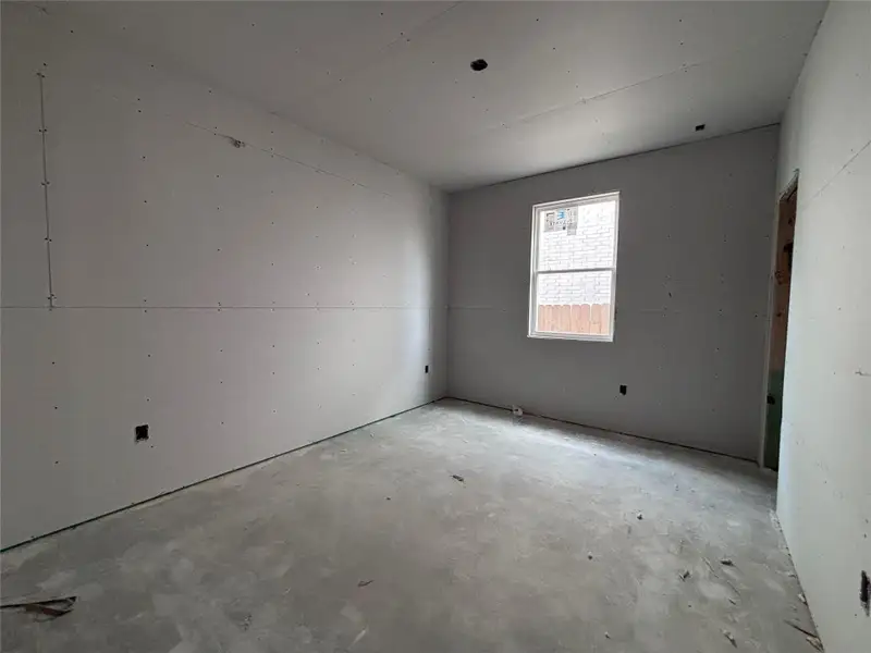 In-progress construction of a new home in The Colony, Bastrop, TX (Image 19).