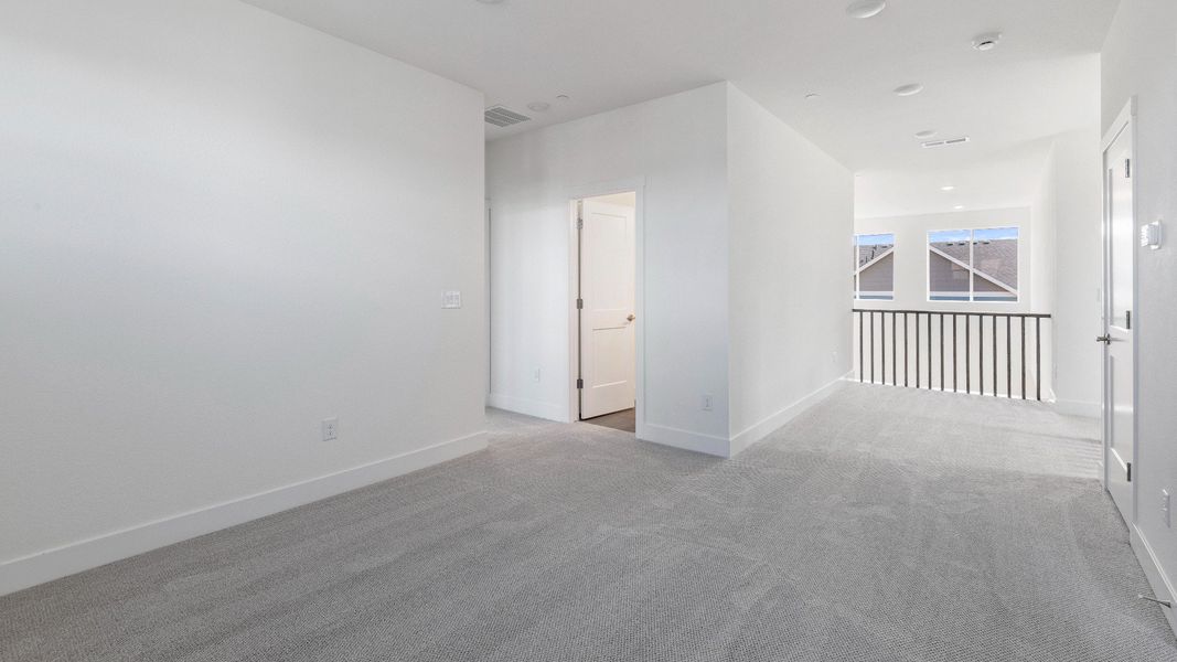 Furnished interior view inside a new home in Dillon Pointe - Journey, Broomfield (Image 25).