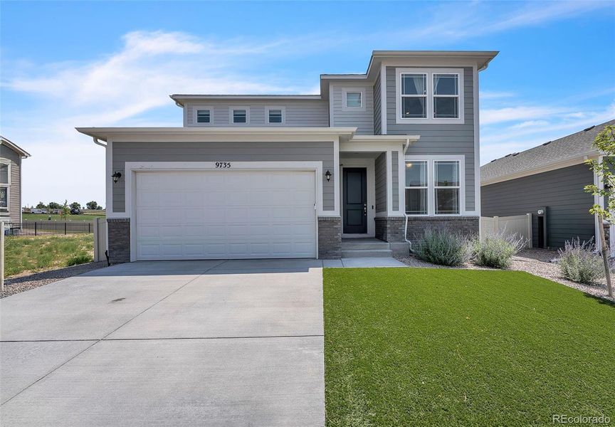 Front exterior of a new home in , Fountain, CO, highlighting curb appeal (Image 32).