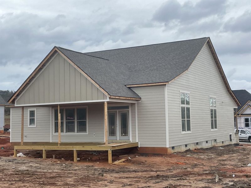Front exterior of a new home in Tubbs Mountain Estates, Travelers Rest, SC, highlighting curb appeal (Image 18). Front exterior of a new home in Tubbs Mountain Estates, Travelers Rest, SC, highlighting curb appeal (Image 18).