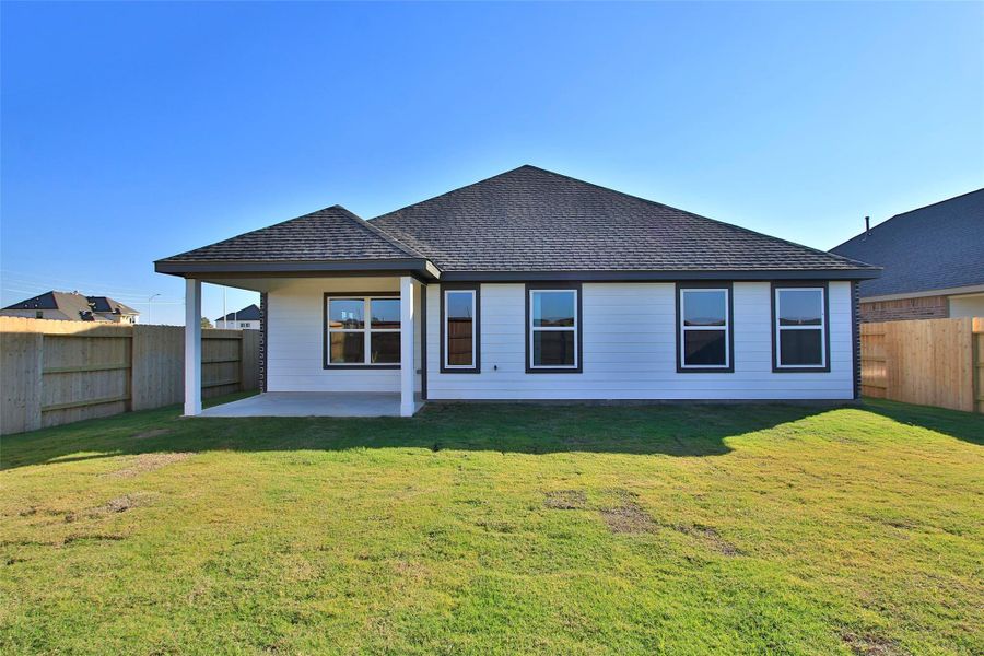 Exterior details and patio area of a home in Oakwood Estates, Waller (Image 2). Exterior details and patio area of a home in Oakwood Estates, Waller (Image 2).
