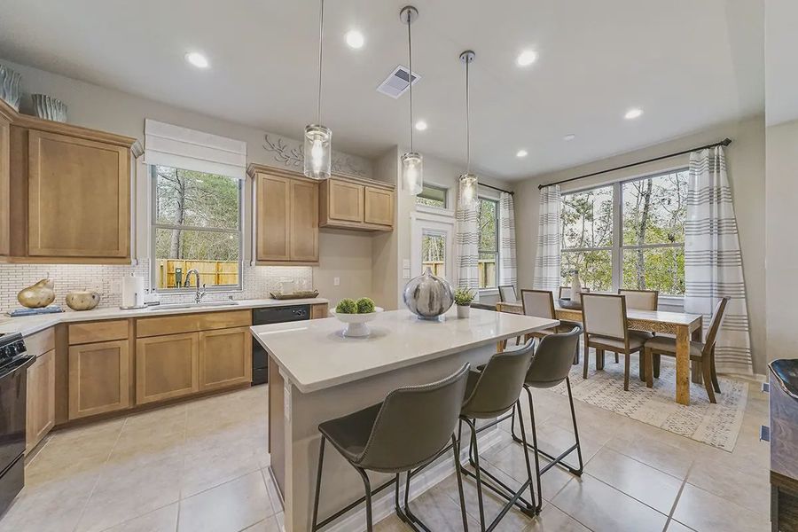 Representative furnished interior of a home built from the Margaux by Chesmar Homes in Meridiana Chateau, Manvel (Image 14).